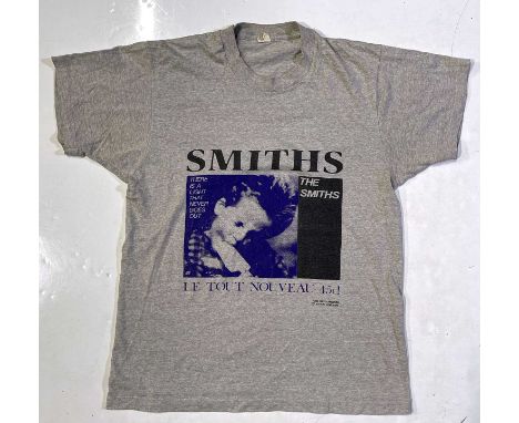 A vintage 1980s t-shirt with 'There Is A Light' print. Good condition. 'Screen Stars' label. Size L. From a large collection 