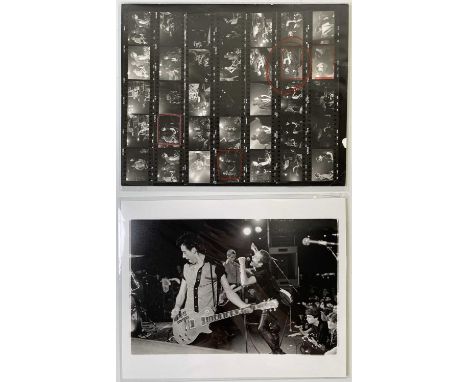 A pair of original vintage hand-made photo prints, one live image and one contact sheet, both signed to reverse by photograph