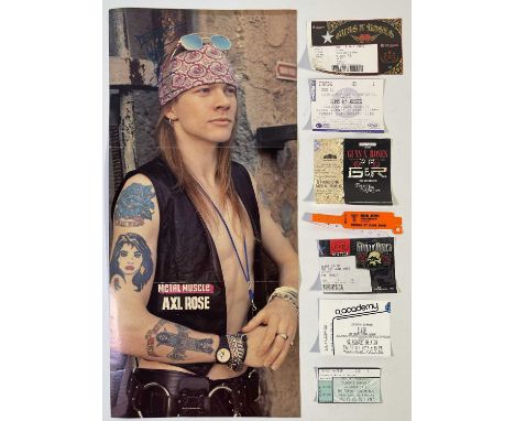 A 'Metal Muscle' fold out poster (27.5 x 59cm) signed with inscription by Axl Rose. Also six ticket stubs and a wristband for