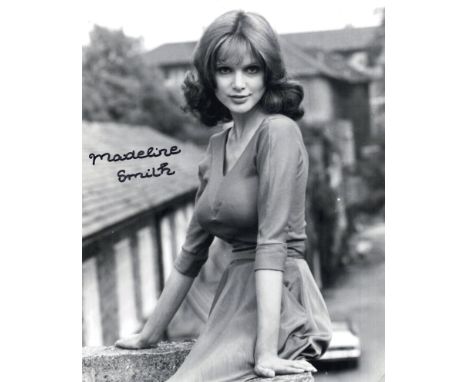 007 James Bond girl and model Madeline Smith signed sexy pose 8x10 BandW photo. Good condition. All autographs come with a Ce