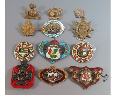 A Collection of Military and other Badges including Canada West Nova Scotia Regiment, sterling silver and enamel badges and o