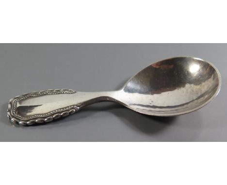 A Georg Jensen Danish Sterling Silver Caddy Spoon, London 1931 import marks, 30g 
