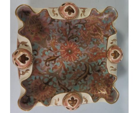 A Zsolnay Pecs Dish with painted and gilt stylised foliate decoration, 22cm, A/F 
