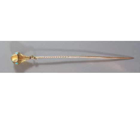 A Victorian Gold Stick Pin, the six sided finial with chased foliate decoration and turquoise to three sides, 11cm, 2.8g 