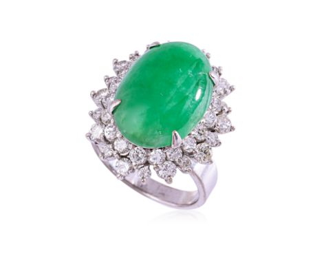 A LARGE TYPE A JADEITE AND DIAMOND RING
Featuring a type a jadeite cabochon measuring approximately 18.22 x 13.20 x 3.63mm, m