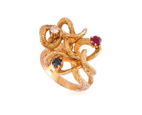 A MULTI GEMS SET RING Featuring a ruby, a sapphire and a white sapphire, totalling approximately 0.30 Cts, mounted in a textu