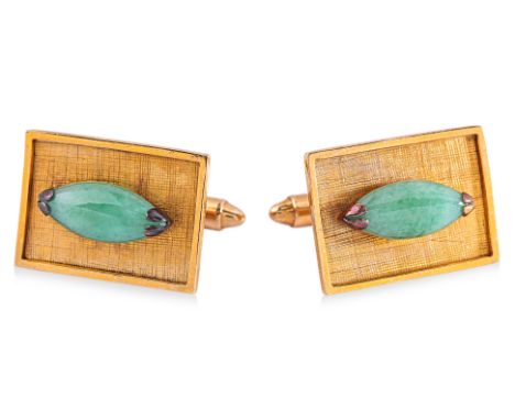 A PAIR OF JADEITE CUFFLINKS Featuring a pair of marquise cabochon jadeite pieces mounted in a yellow gold setting with Chines