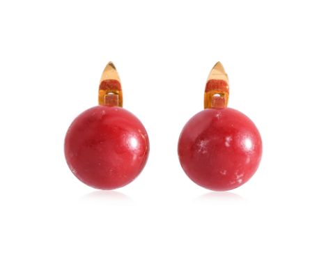 A PAIR OF RED CORAL EARRINGS
Featuring a pair of button shape red corals measuring approximately 12 x 9mm, mounted in a yello