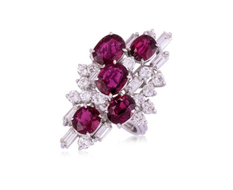 AN UNHEATED RUBY AND DIAMOND RING
Featuring five unheated oval cut rubies, totalling approximately 5.40 Cts, mounted in a whi