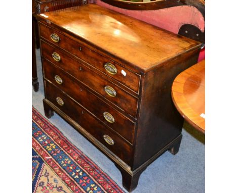A George III mahogany chest of drawers, the rectangular cross banded top above four graduated drawers 