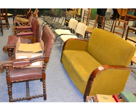 A 1930's two seater sofa, a pair of chrome and cream painted metal chairs, three 1920's oak chairs, two folding chairs, three