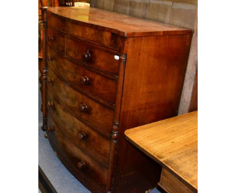 A 19th century mahogany bow fronted five height chest of drawers