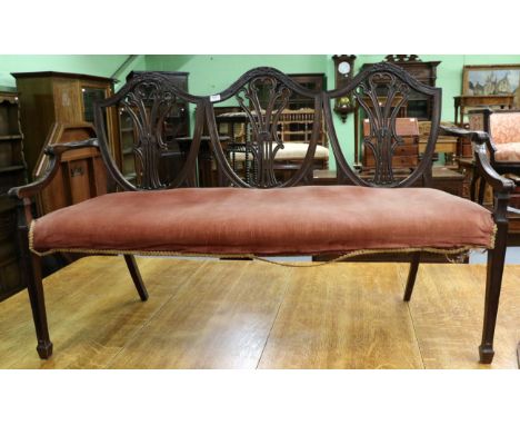 A mahogany shield back sofa (a.f.)