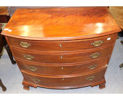 A mahogany bow front four height chest of drawers