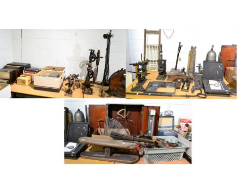 A collection of items including cobblers lasts, clock elements, drain rods, vintage radios, cast iron table top drills, 'Phoe