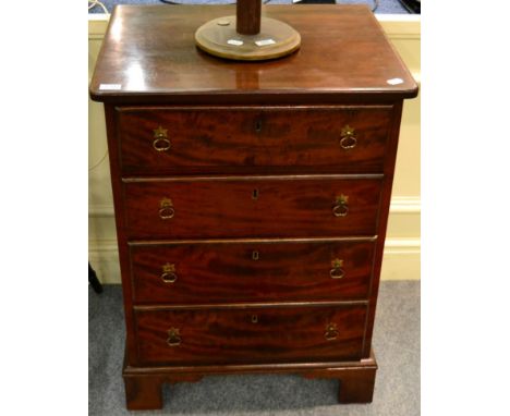 A George III mahogany four height chest of drawers of small proportions
