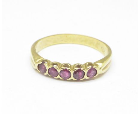 A 9ct gold, five stone ruby ring, 2.7g, O 