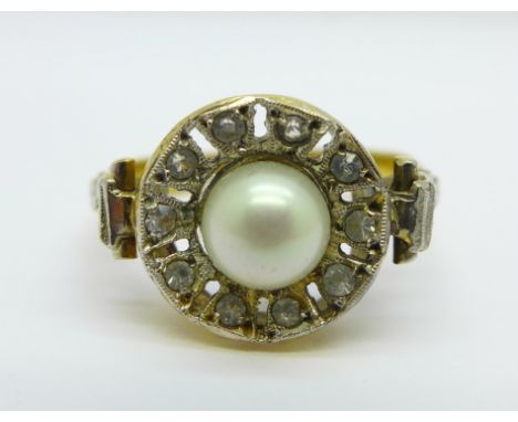 A yellow and white metal, pearl and white stone set ring, 2.3g, L 