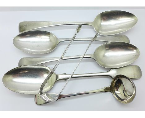 A Georgian silver spoon, a Scottish silver ladle, a pair of early white metal sugar bows, an Elkington plated spoon and a pai