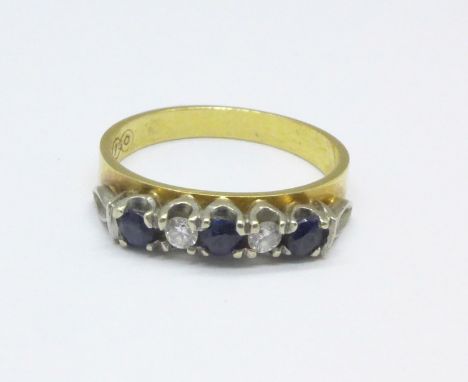 A yellow metal, blue and white stone ring, 2.9g, K 