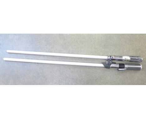 Two vintage Star Wars light sabres 