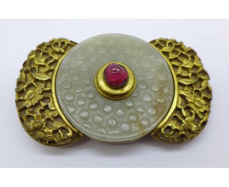 An 18th Century Indian gilt metal buckle set with jade and ruby 