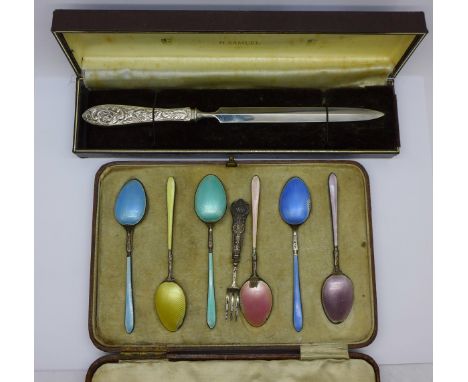 A cased set of six silver and enamel spoons, a/f, a small pickle fork and a silver handled letter opener 