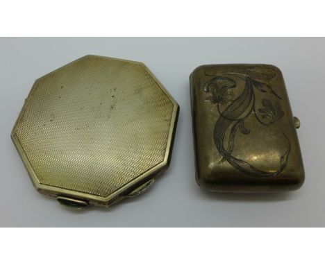 A silver compact and a small Russian silver purse marked 84 
