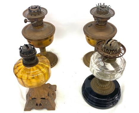 Selection of antiques/vintage oil lamps. 