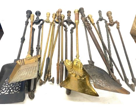 Large selection of vintage fire irons 