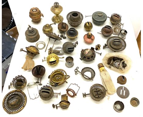 selection of spare oil lamp parts with burners. 