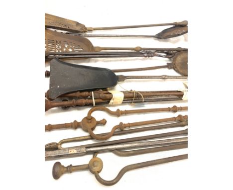Selection of vintage fire irons. 