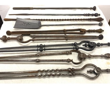 Selection of vintage fire irons. 