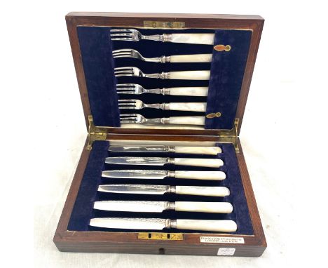 Vintage boxed silver plated, mother of pearl handled knife and fork set 