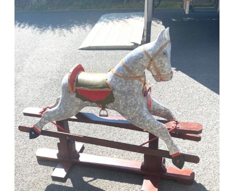 Vintage childs rocking horse, has got damage to neck and leg, measures approx 116cm tall 130cm wide seat height 75cm