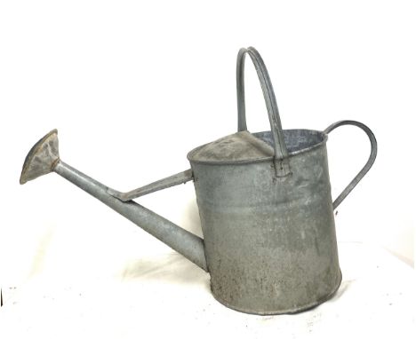 Galvanished vintage watering can with rose 