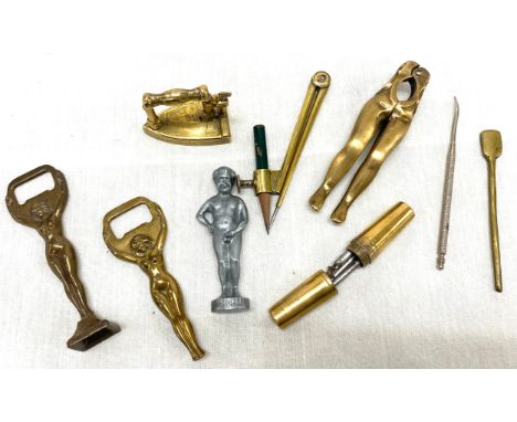 Tray of small collectable brass pieces to include Lady nut cracker, lady bottle opens, etc 