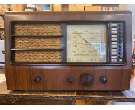 VINTAGE EKCO TABLETOP RADIO. A vintage WWII tabletop radio receiver built by E.K. Cole &amp; Company of Southend. Features mo