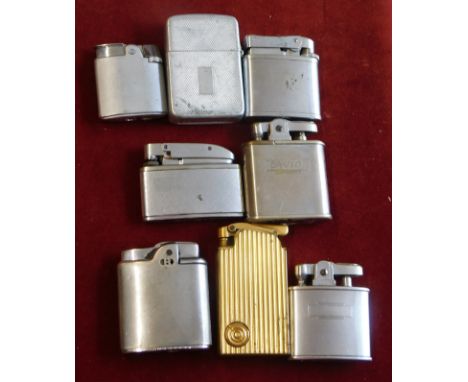 Lighters - A collection of (8) vintage lighters including (6) Ronson lighters, (1) Flamsong musical lighter and Storm King li