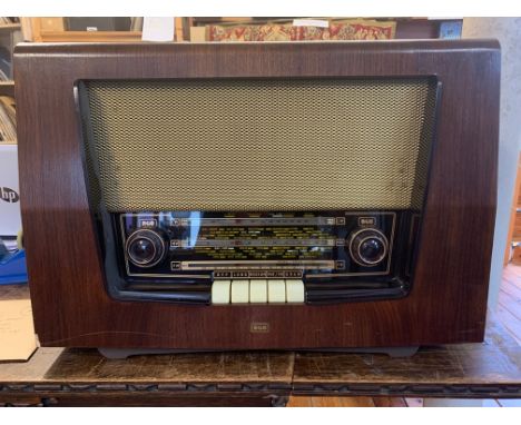 VINTAGE RGD RADIO RECEIVER. A vintage RGD AC tabletop radio receiver circa 1958. Housed in an attractive wooden casing with a