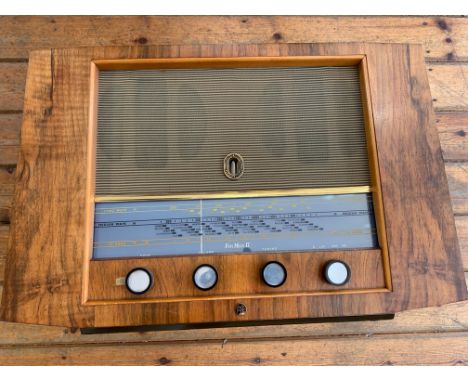 VINTAGE PYE RADIO RECEIVER. A vintage Pye FenMan II tabletop LW/MW/FM radio receiver in an attractive walnut veneered casing.
