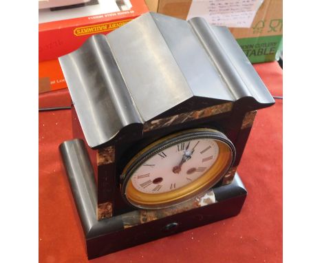 French Marble Chiming Mantel Clock, made in the 1880s, contrasting slate and marble case and perfect enamelled dial. Some wea