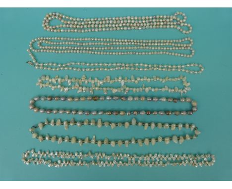 Seven pearl necklaces including freshwater in different colours,  some extremely long examples and irregular shapes 