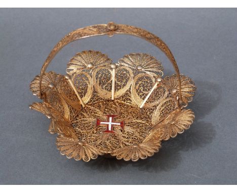 A filigree gilt basket with all over pierced scrolling decoration and an enamel Maltese Cross to the centre, weight 37g, diam