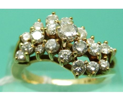 An 18ct gold ring set with 21 round cut diamonds in a floral cluster, total diamond weight approx 0.9ct (Size N)