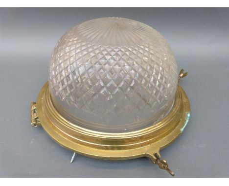 A cut glass brass framed ceiling lamp with hinged porthole style frame, diameter approximately 50cm 