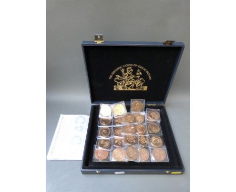 A cased set 'The Imperial Russian Collection' comprising twenty four high relief portrait coins pewter/copper golden alloy, e