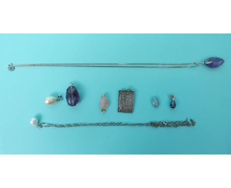 Two amethyst pendants, three pearl pendants and silver chains