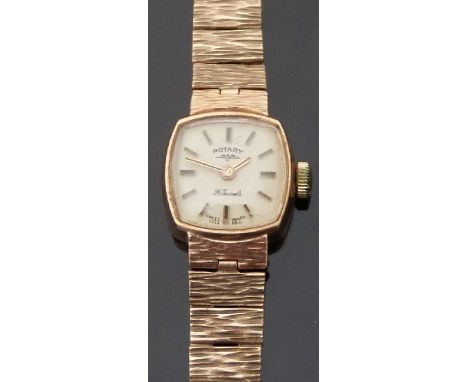Rotary 9ct gold ladies wristwatch with two tone hands and baton numerals, on bark effect bracelet, case diameter 15mm, 16.4g.