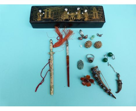 A silver pen with agate handle, Chinese coral rings, amber brooch, a Chinese filigree brooch set with coral turquoise and ena